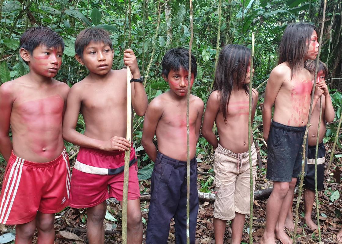 Several children of the Sapara indigenous people hold tree stems as lances during a traditional ceremony in Llamchamacocha, Ecuador, 19 June 2020 (issued 29 June 2020). EPA-EFE/DANIELA BRIK/FILE