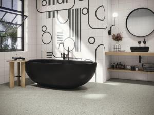 Pie de foto: Baño diseñado con las piezas Jai de Esencia Material. Autor: APE Grupo