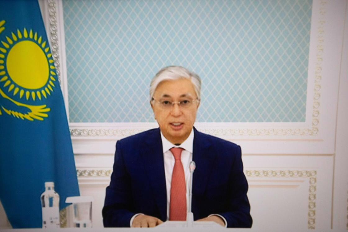 Johannesburg, South Africa, 24/08/2023.- Kazakhstan's President Kassym-Jomart Tokayev appears on a screen during the Friends of BRICS Leaders dialogue at the 15th BRICS Summit, in Johannesburg, South Africa, 24 August 2023. South Africa is hosting the 15th BRICS Summit, comprising Brazil, Russia, India, China, and South Africa. The BRICS group's economies account for a quarter of the global gross domestic product. EFE/EPA/KIM LUDBROOK