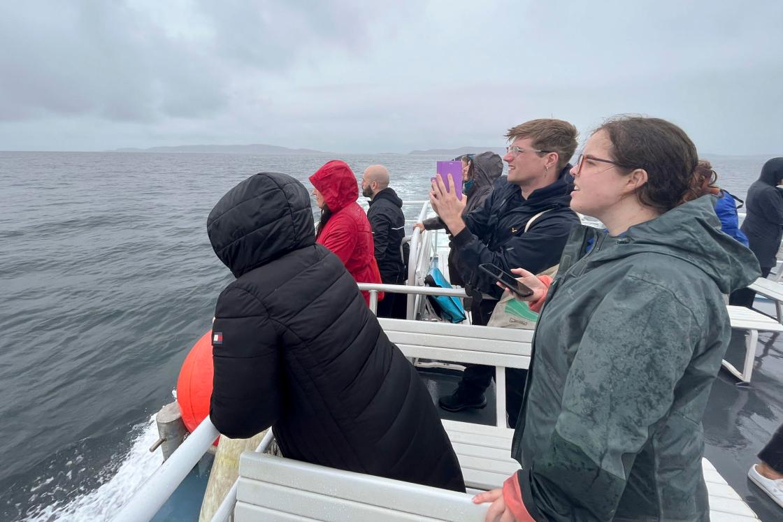 A group of people take part in a boat tour around the Celtic Sea, organized to introduce a project that uses AI to protect cetaceans along the coasts of Ireland. EFE/Bruno Fortea Miras.