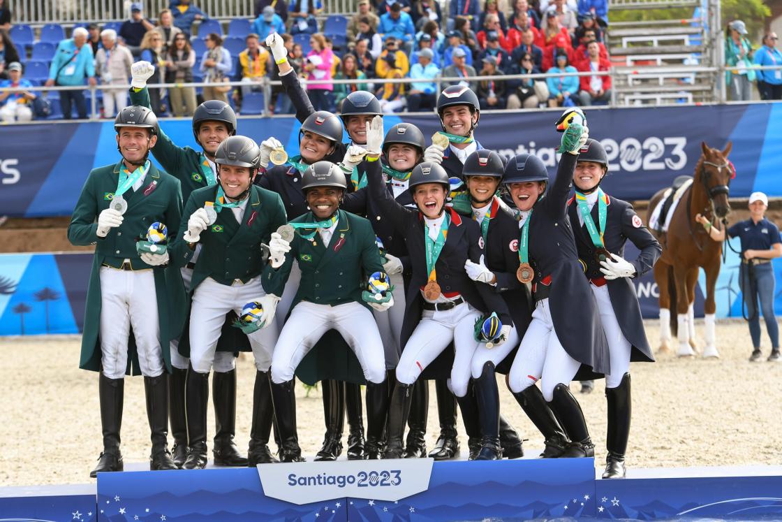 Photograph provided by FEI showing the teams from Brazil, Canada, and the United States celebrating their Pan American medals at the 2023 Pan American Games. EFE/ Courtesy of FEI.