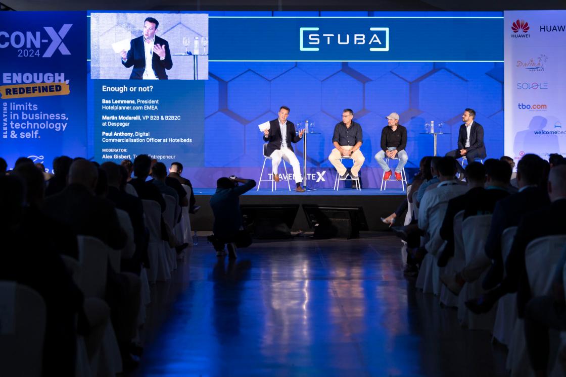 BUNYOLA, SPAIN, 22/05/2024.- Bas Lemmens (2R), President at Hotelplanner EMEA; Martin Modarelli (R), Vice President of B2B and B2B2C at Despegar; Paul Antony (2L), Head of Digital Commercialization at Hotelbeds and moderator Alex Gilbert (L) of Travel Entrepeneur, during the Con-X conference organized by TravelgateX in Bunyola, Spain, where some 500 executives from tourism companies gather to discuss sector innovations. EFE/CATI CLADERA