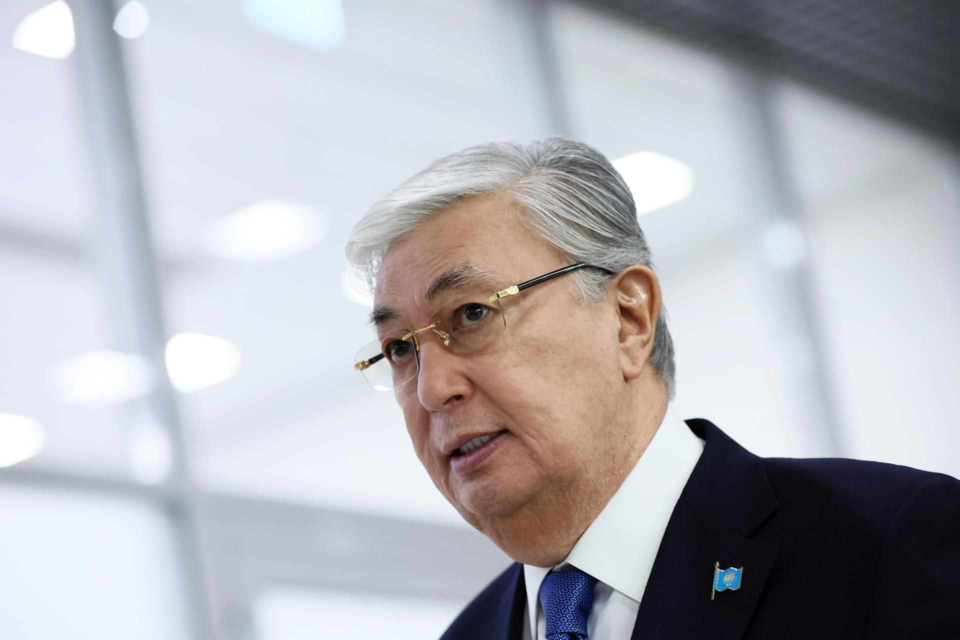 Kazakh President Kassym-Jomart Tokayev shooting journalist Ukraine