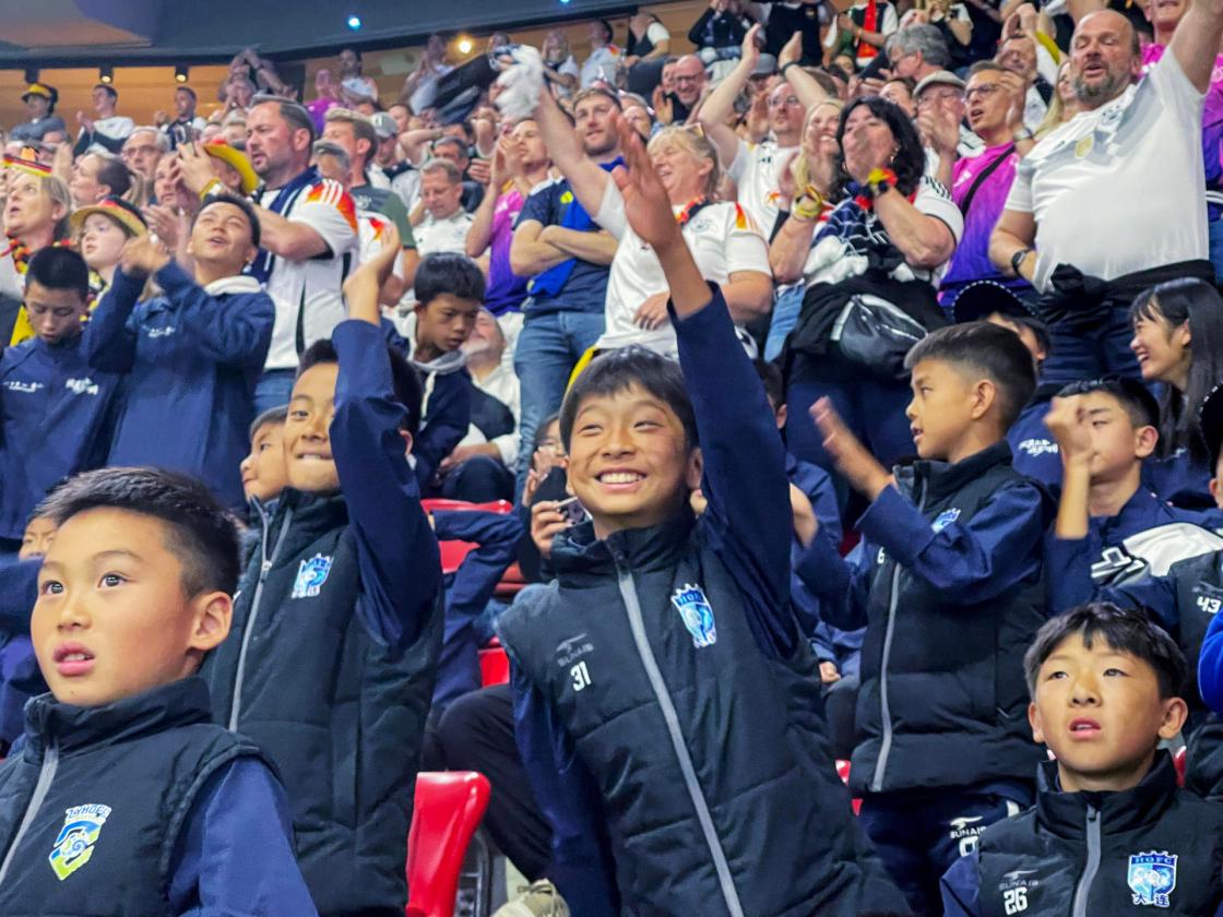 A group of Chinese teenagers in football attend the opening ceremony of the UEFA EURO 2024 in Munich, Germany on June 14, 2024