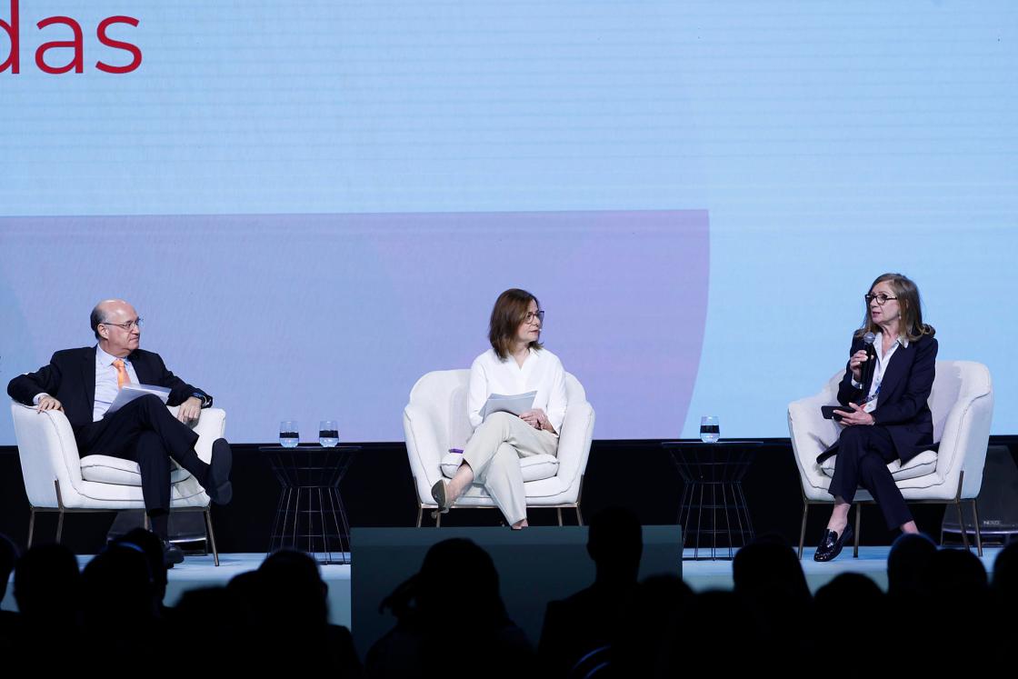 Inter-American Development Bank (IDB) President Ilan Goldfajn (L), IDB Communications Division Chief Yolanda López de Otero (C), and Vice President for Countries and Regional Integration Anabel González attend the opening day of the 2025 Annual Meetings of the IDB and IDB Invest Boards of Governors in Santiago, Chile. EFE/Elvis González