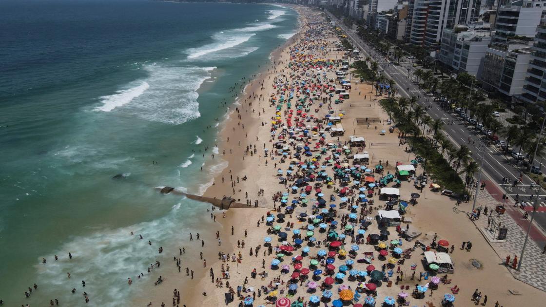 File photo dated Nov. 12, 2023, showing people on Ipanema Beach in Rio de Janeiro, Brazil. EFE/Antonio Lacerda /FILE