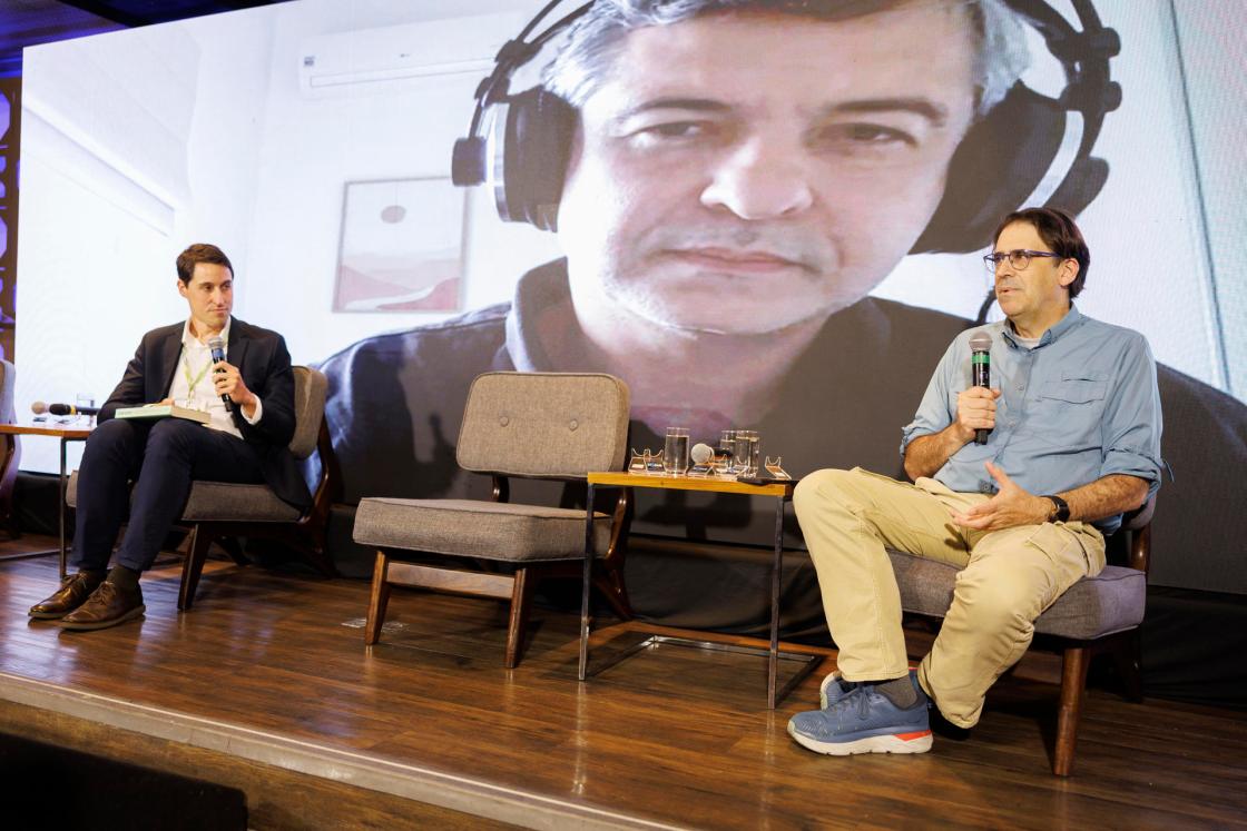 Tasso Azevedo (R), general coordinator of the MapBiomas network, speaks alongside Manuel Pérez Bella (L), EFE’s managing director in Brazil, during the 3rd Latin American Green Economy Forum (FLEV) on Thursday in São Paulo, Brazil. EFE/Isaac Fontana