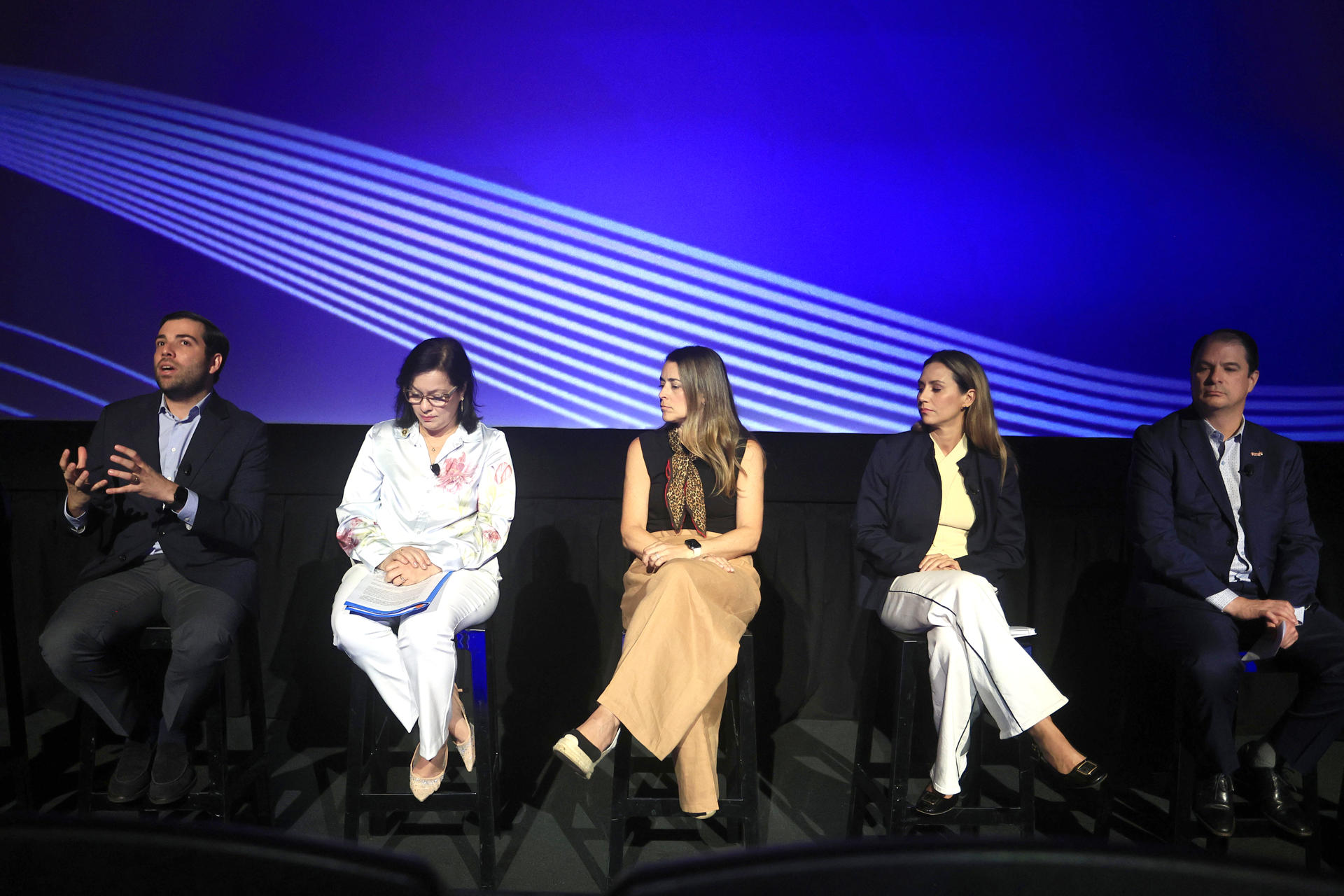 From left to right: Puerto Rico Secretary of Economic Development and Commerce Sebastián Negrón Reichard; Secretary of Academic Affairs at the Puerto Rico Department of Education Beverly Morro; Banco Popular Vice President of Innovation and Technology Camille Burckhart; Abarca Health President Adriana Ramírez; and Claro CEO Enrique Ortiz de Montellano attend the roundtable AI Revolution: An Opportunity for Businesses in Puerto Rico on Wednesday in San Juan, Puerto Rico. EFE/Thais Llorca